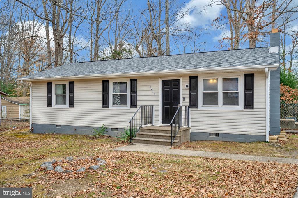 2416 QUAIL OAK DRIVE