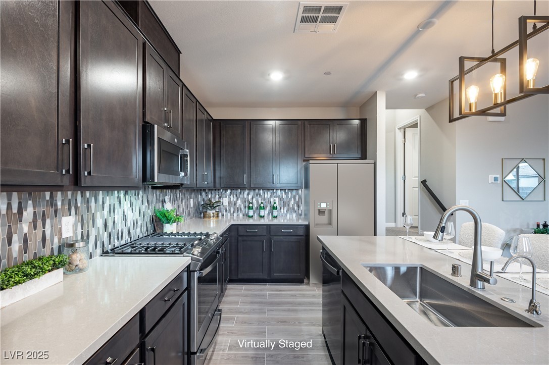 11832 Dragontail Peak Avenue