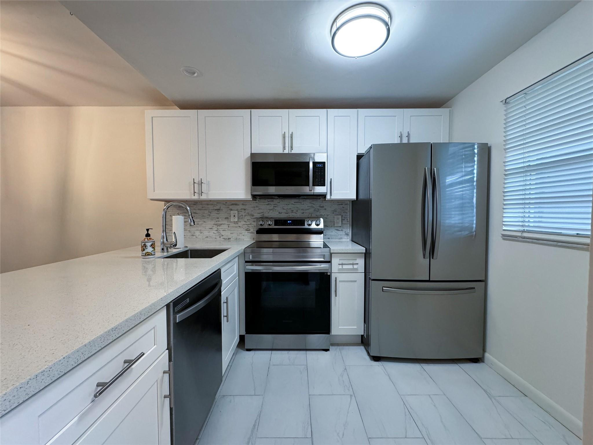 9450 Poinciana Place 311