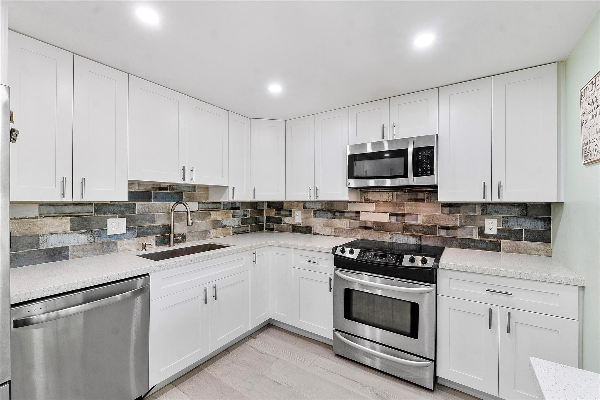 4261 W Palm Aire Drive 203