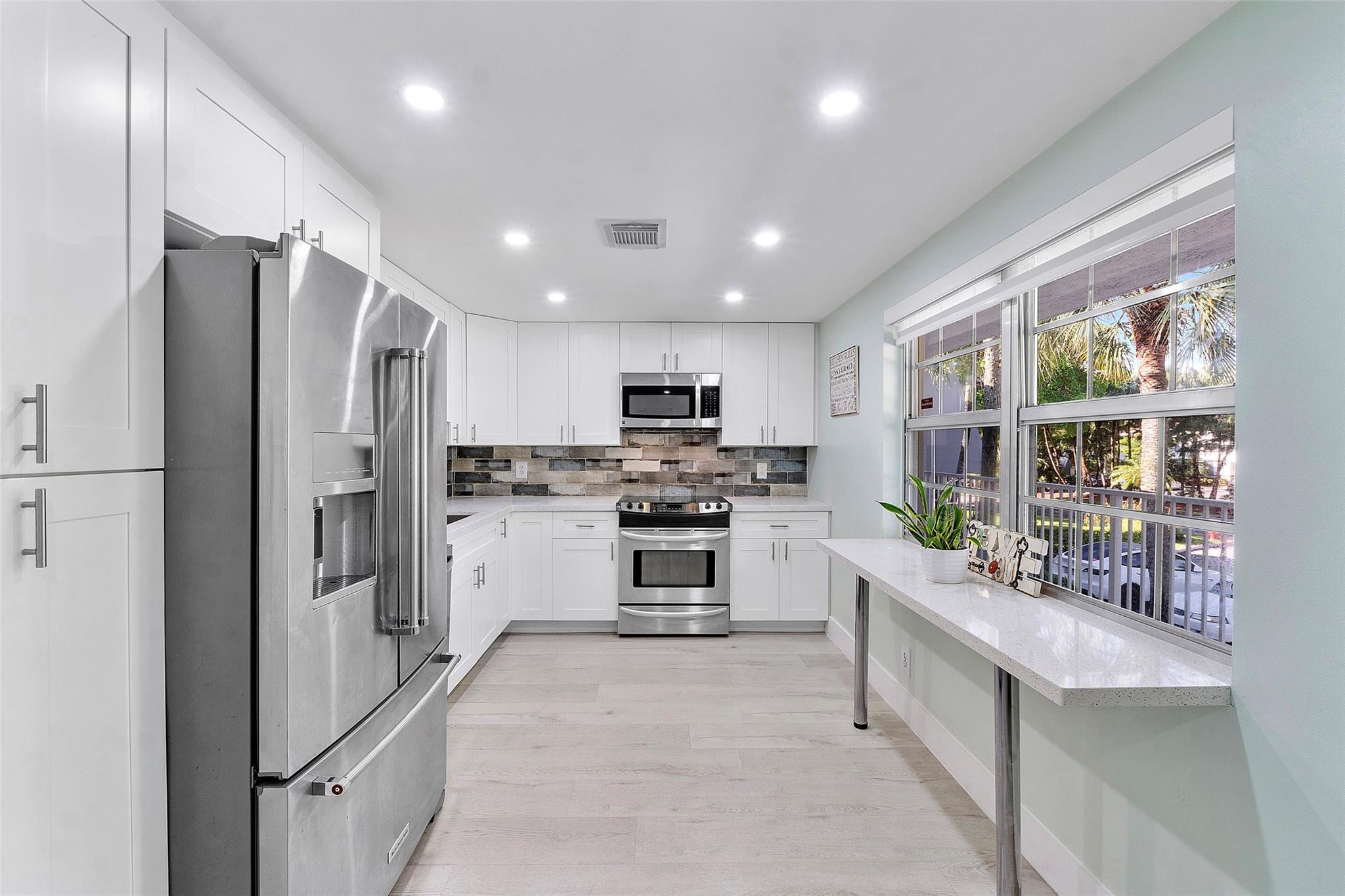 4261 W Palm Aire Drive 203