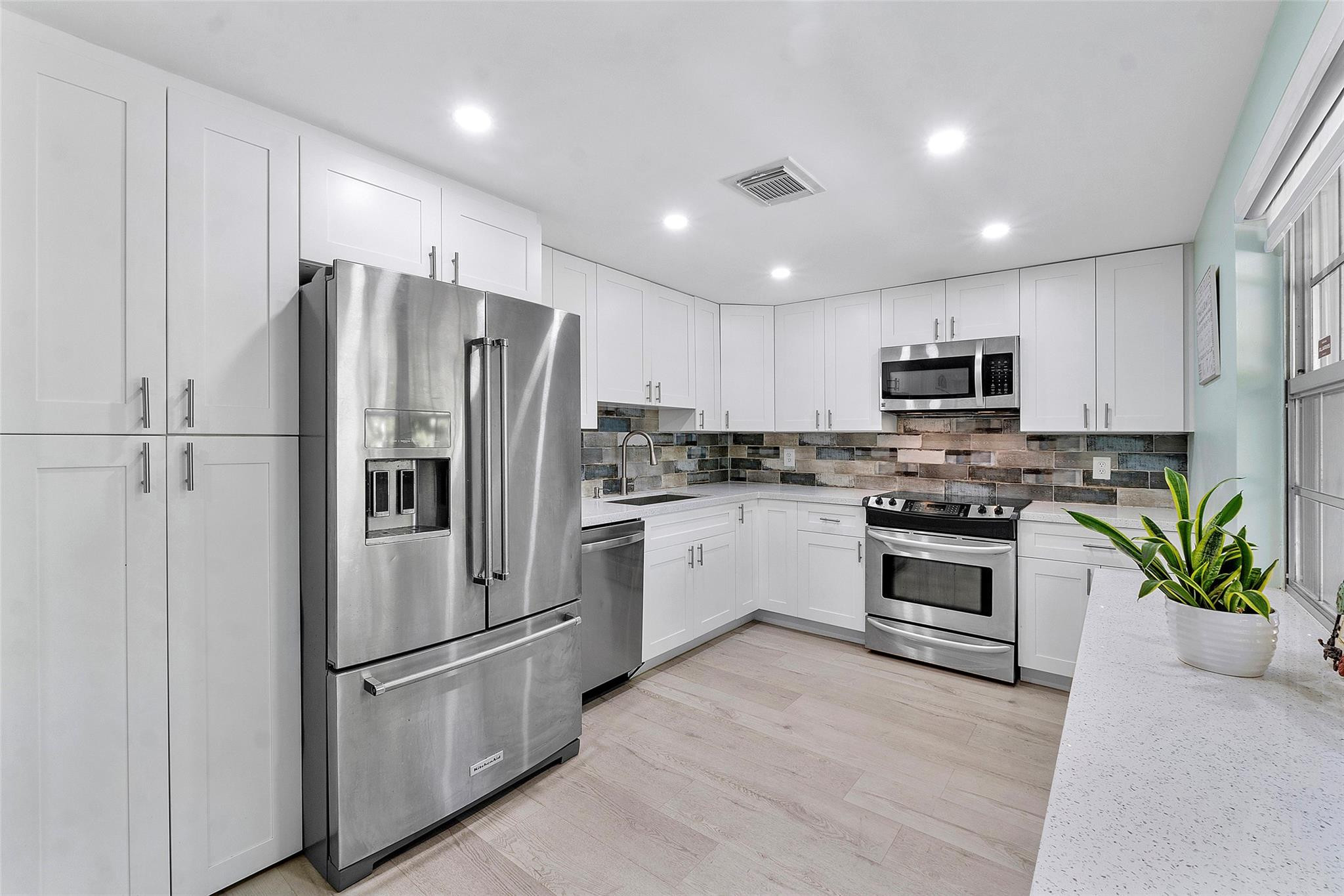 4261 W Palm Aire Drive 203