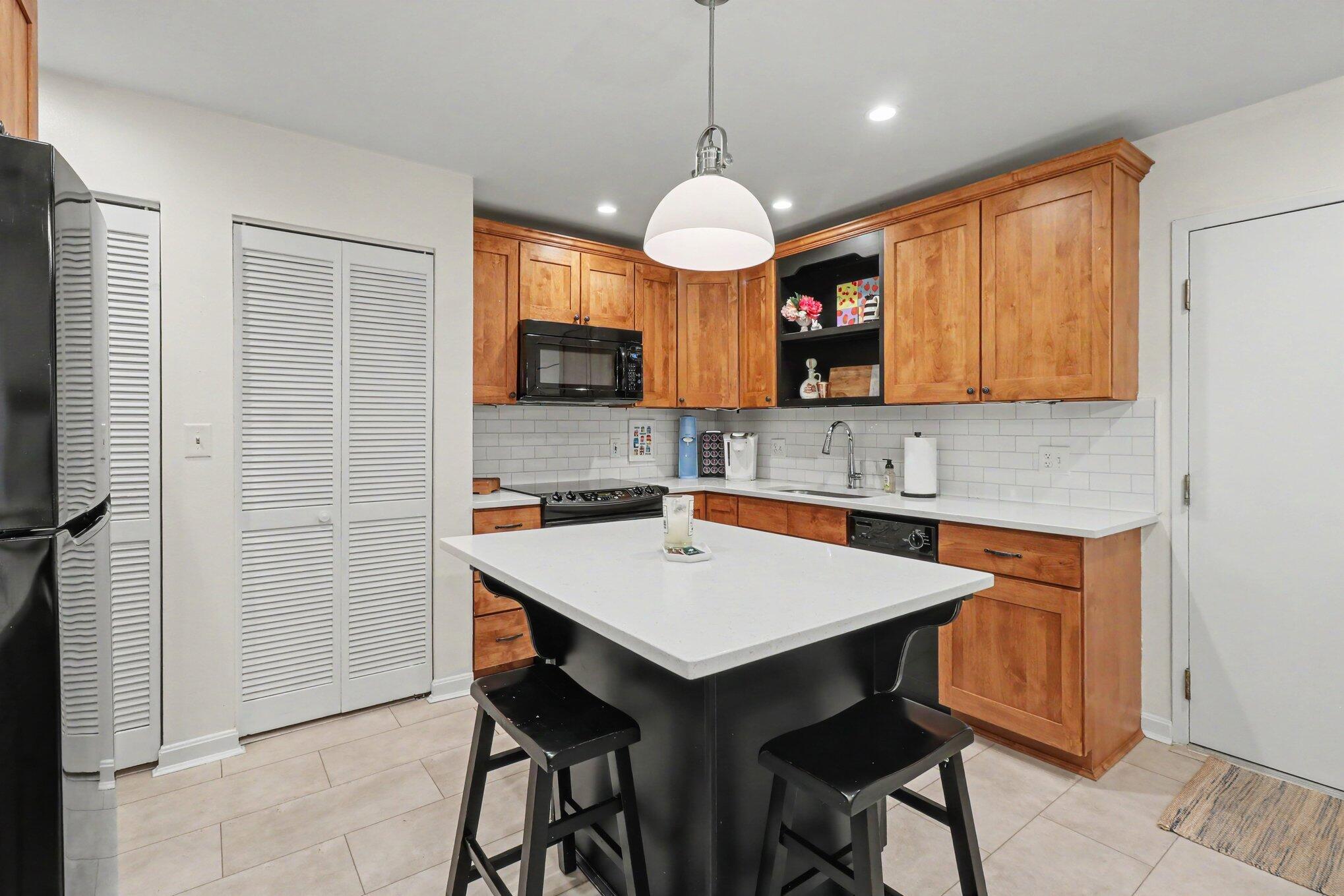 323 E 2nd Street, 105