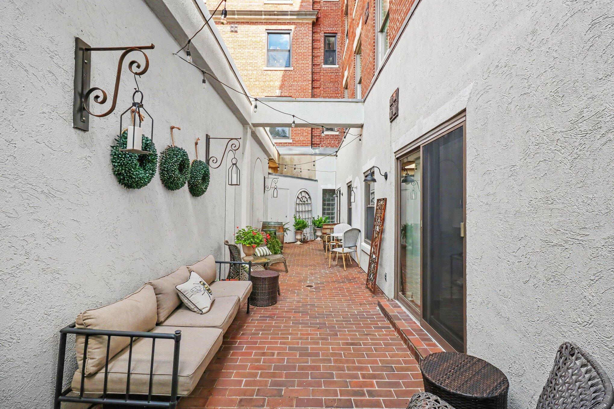 323 E 2nd Street, 105