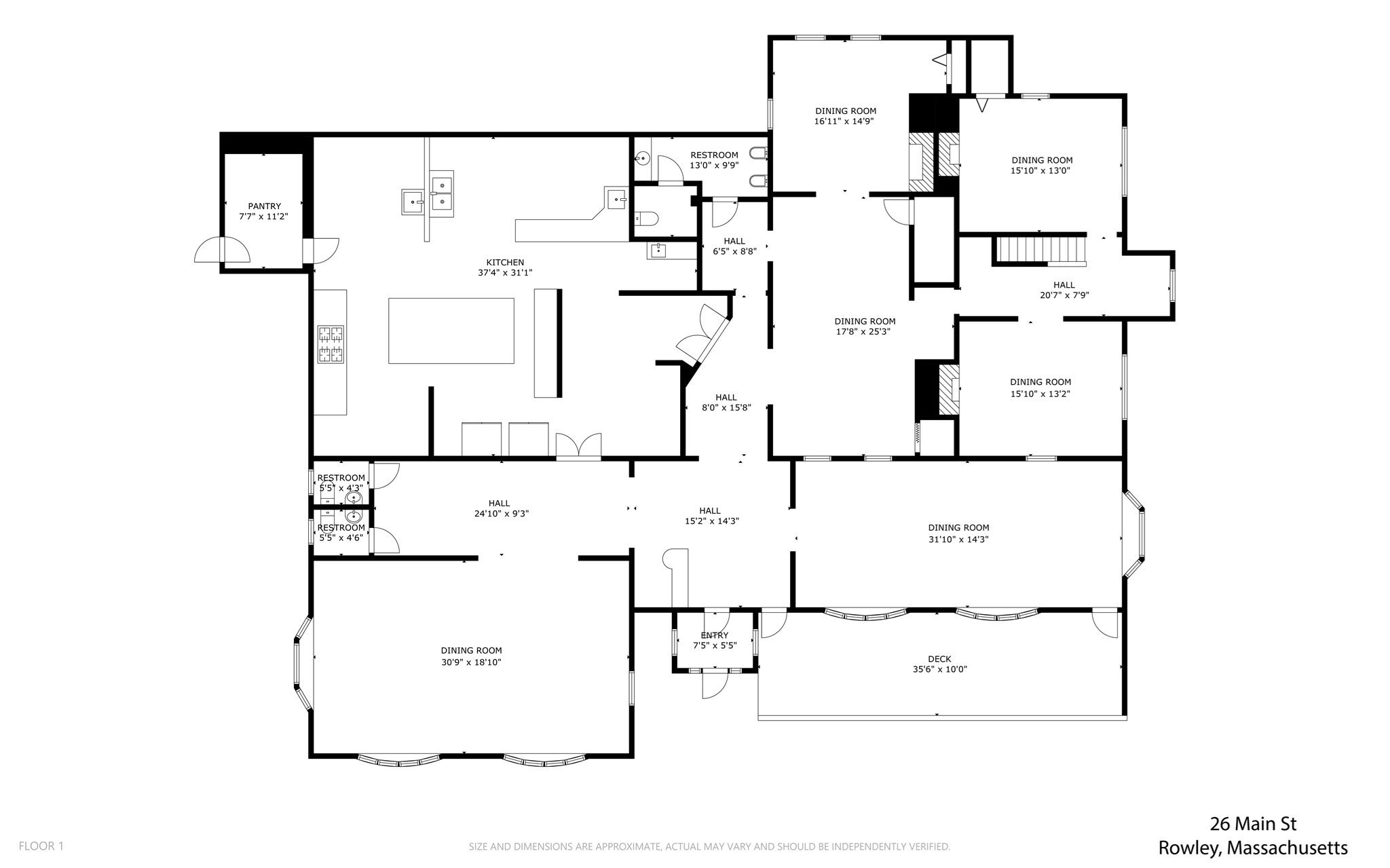 First-floor plan of 26 Main St, showing a large kitchen, multiple dining rooms, and a broad rear deck.