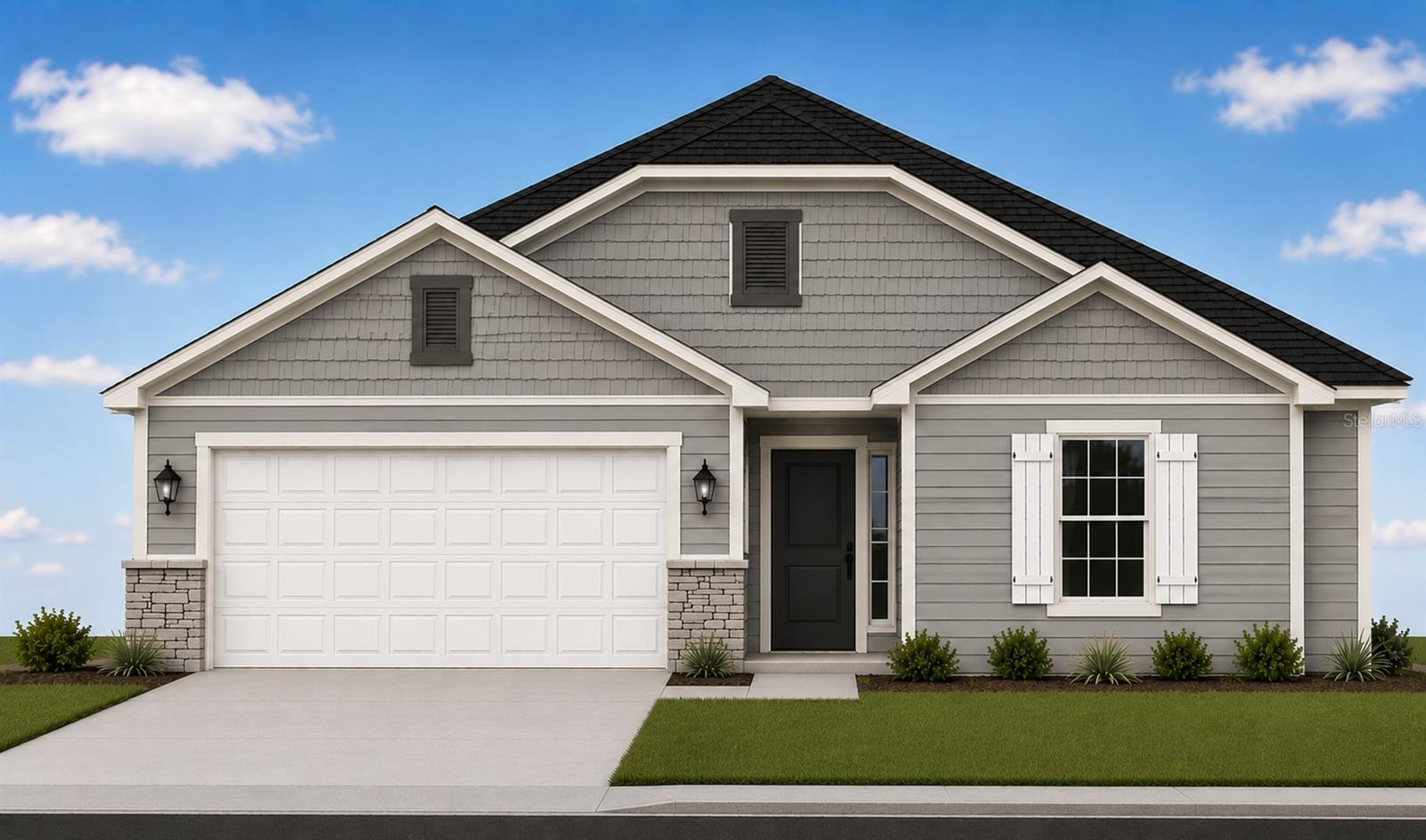 A front view of a gray single-story house with a white garage door and black accents against a clear blue sky