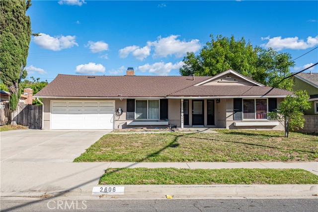 Recently sold single-story Texas home with a two-car garage, covered front porch, and broad driveway.