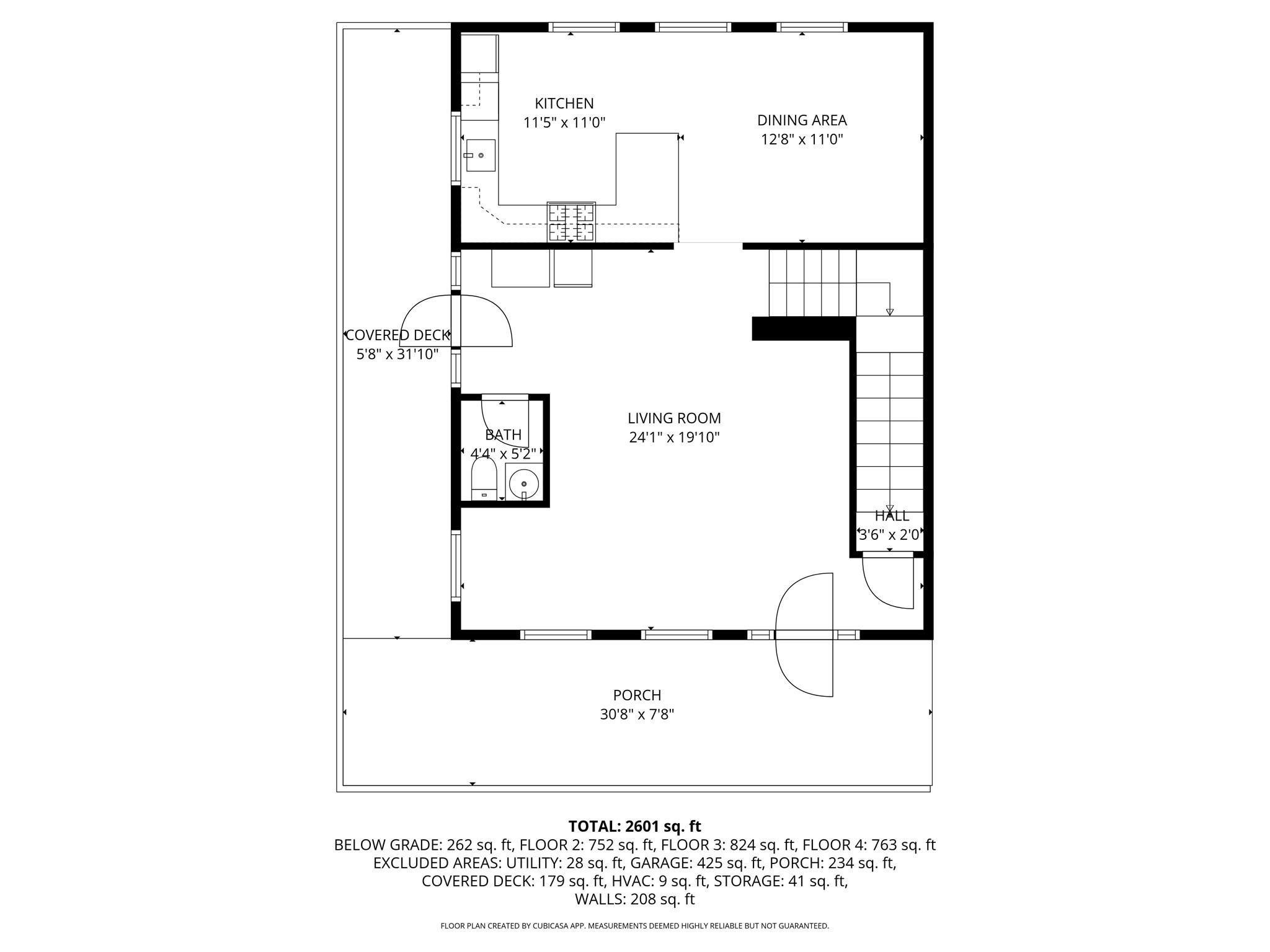 Floor plan showing kitchen, dining area, living room, bath, porch, and covered deck.