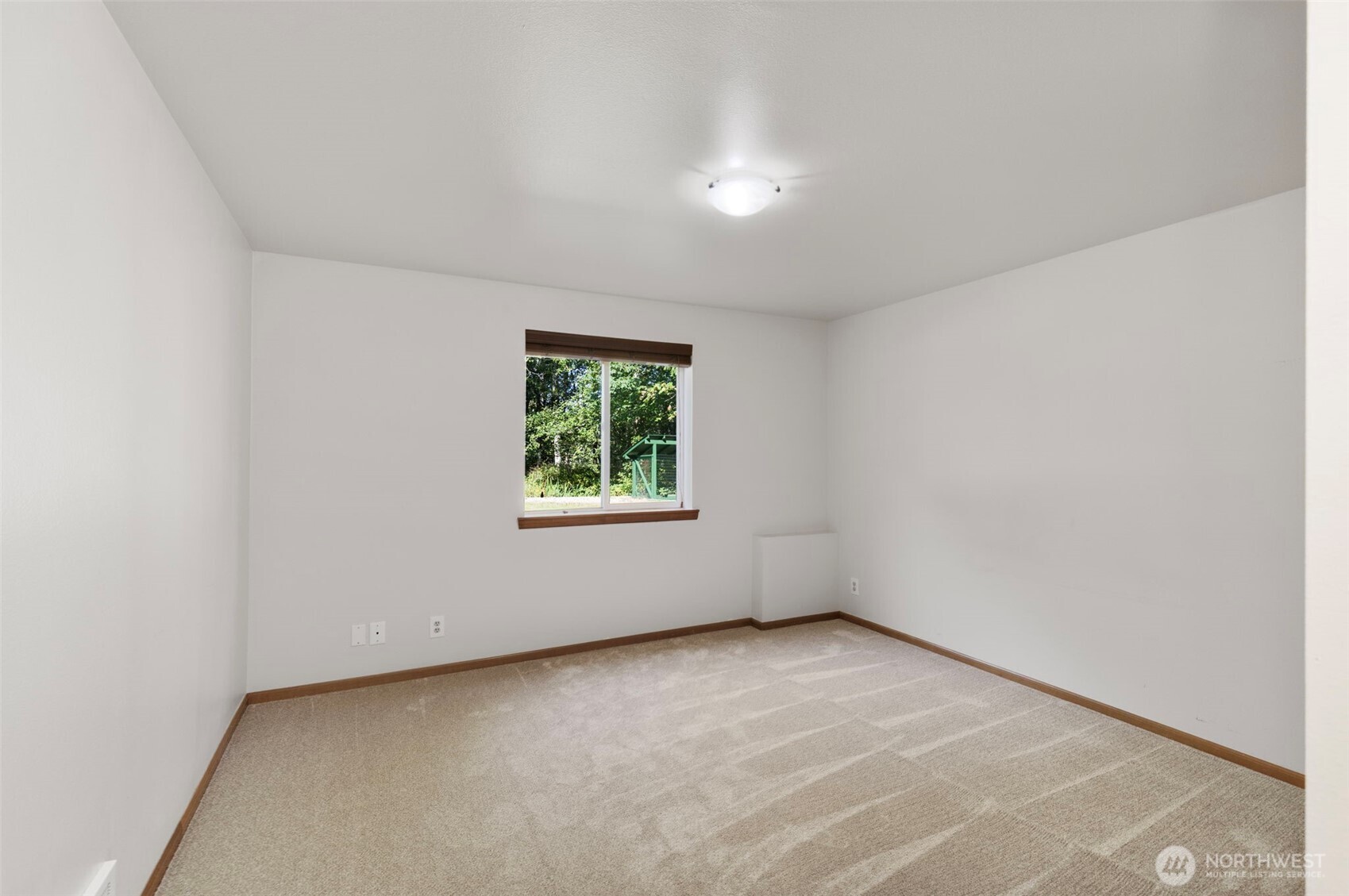 8430 NE Country Woods Lane