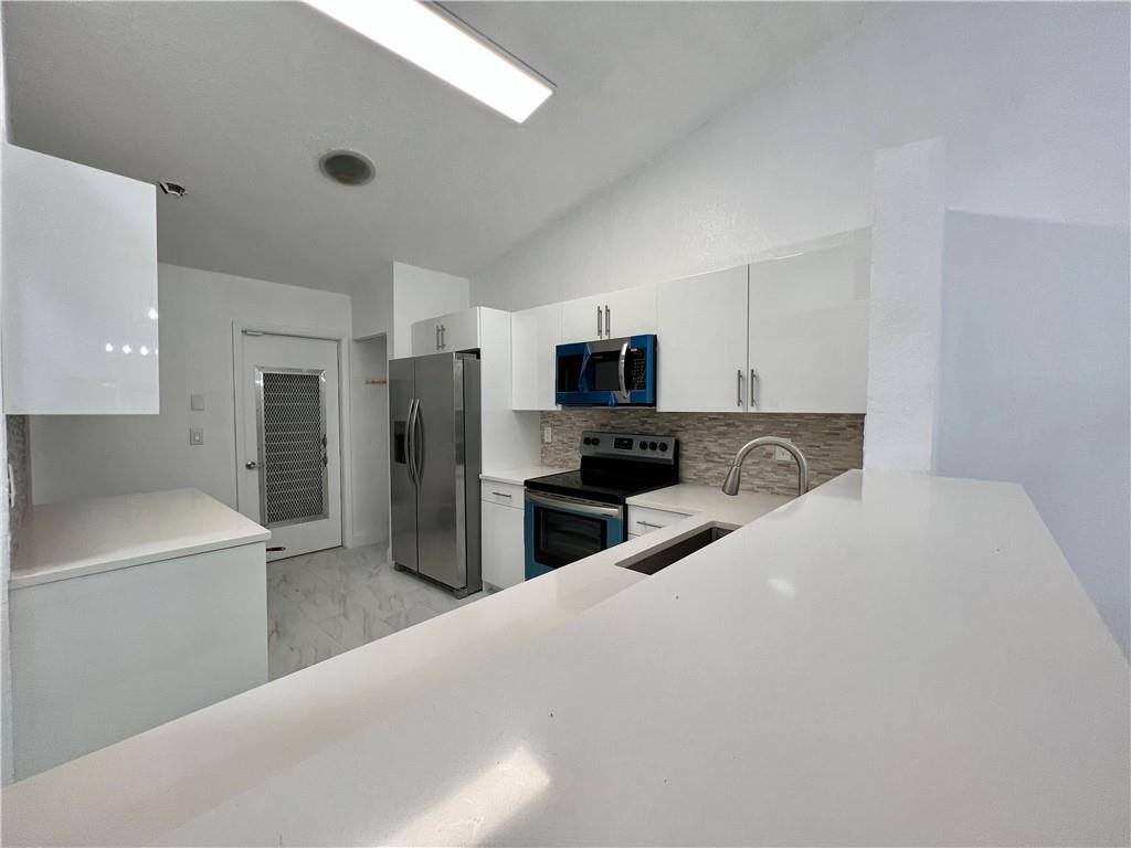 6071 NW 92nd Ave