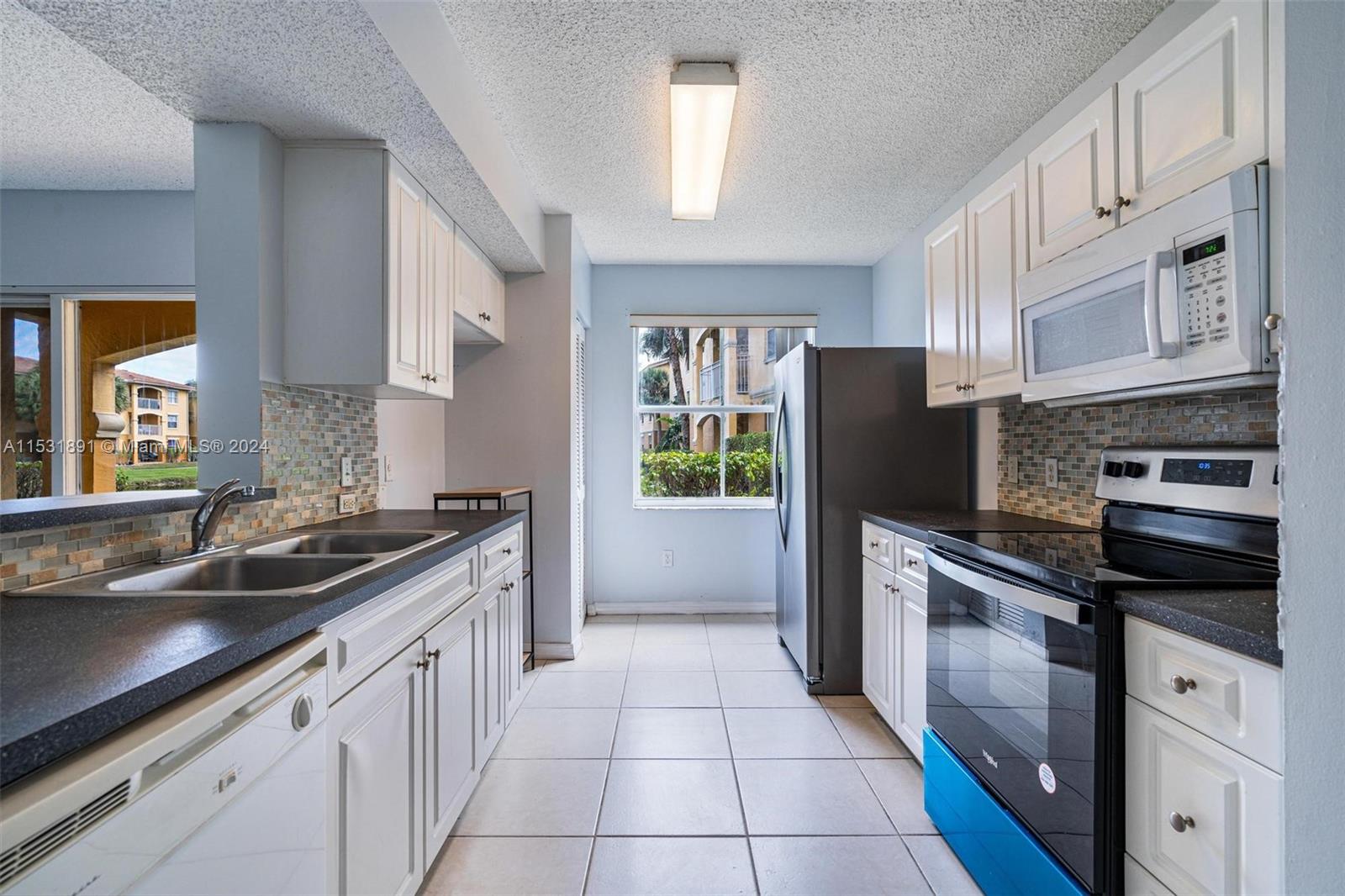 155 NW 96th Ter # 102 Unit: 2-102