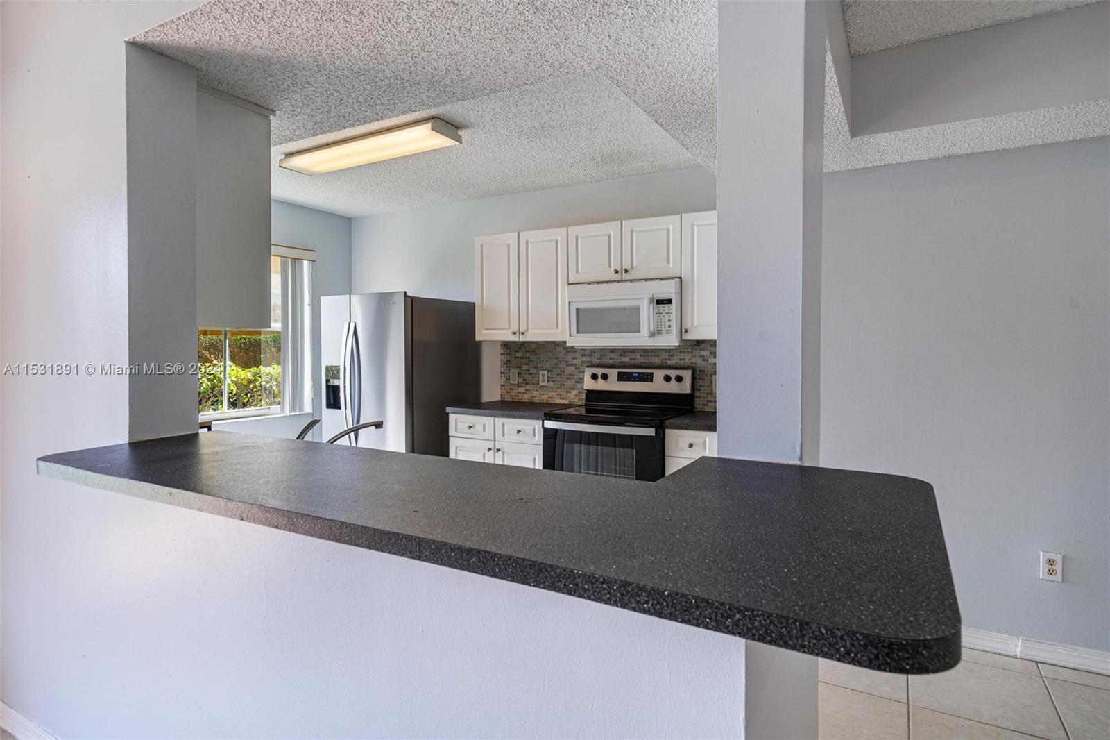 155 NW 96th Ter # 102 Unit: 2-102