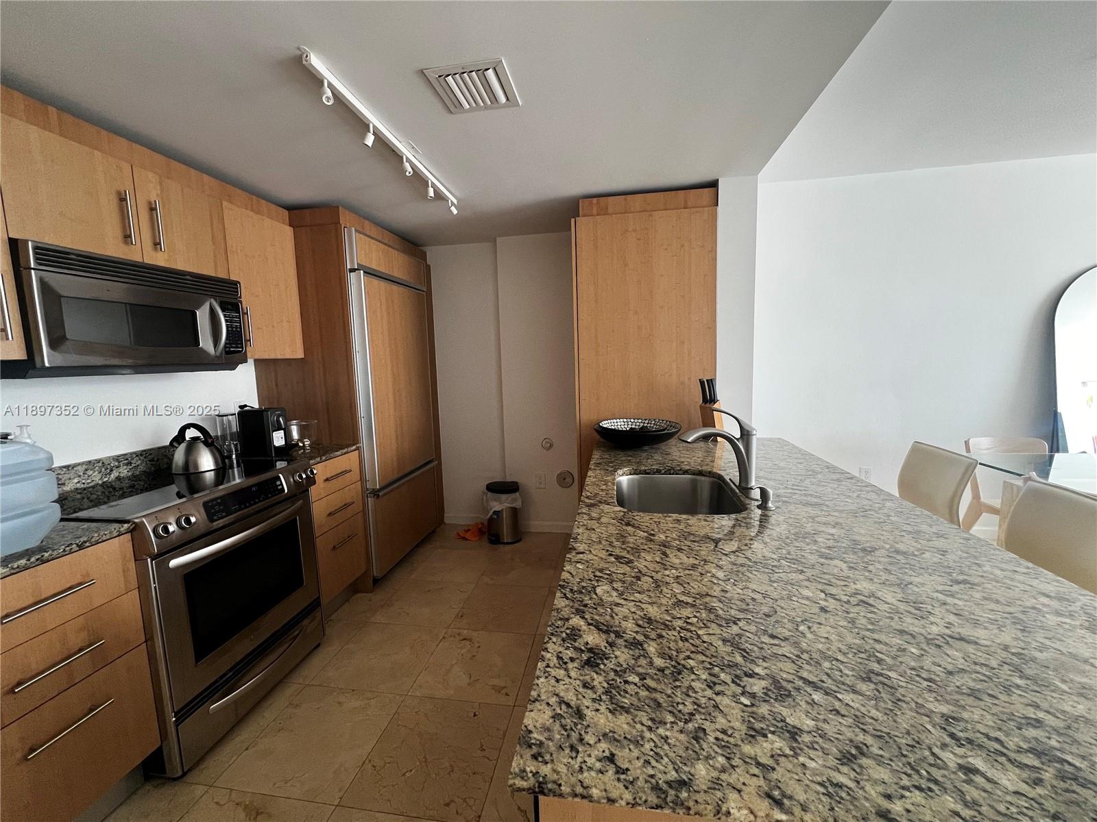 10275 Collins Ave # 214