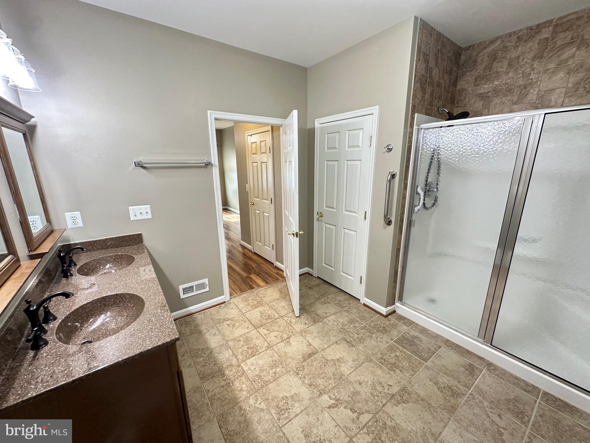 6504 FEATHER EDGE COURT