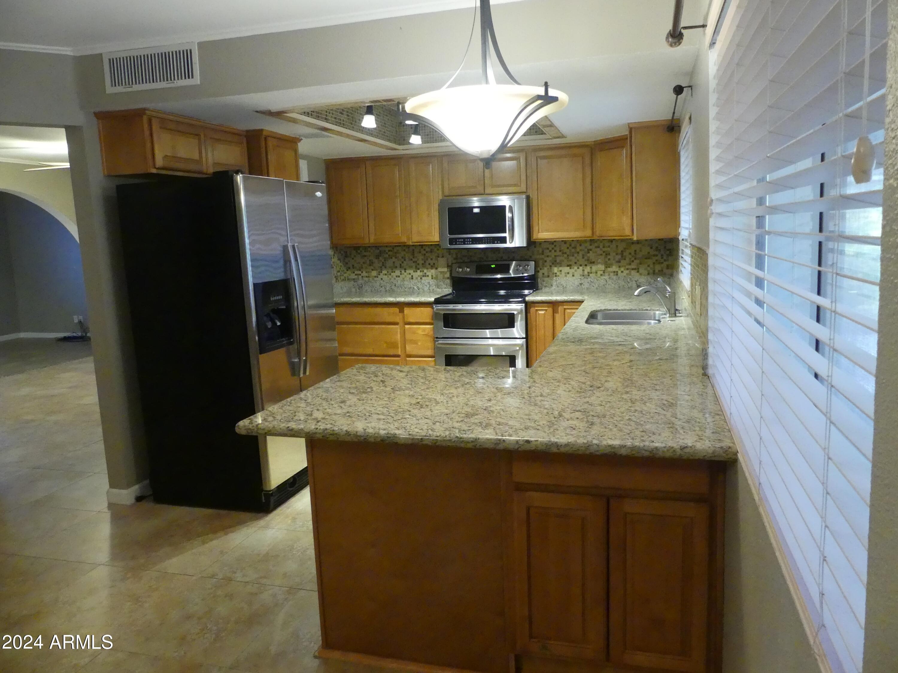 1245 W MENDOZA Avenue