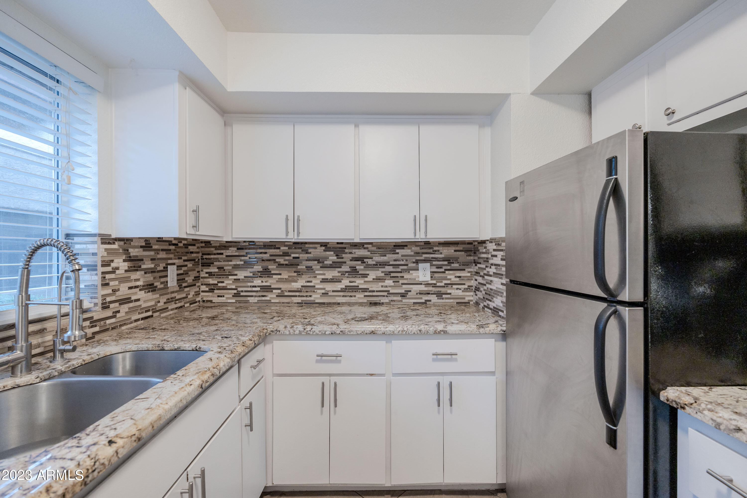 4554 E PARADISE VILLAGE Parkway N, 104