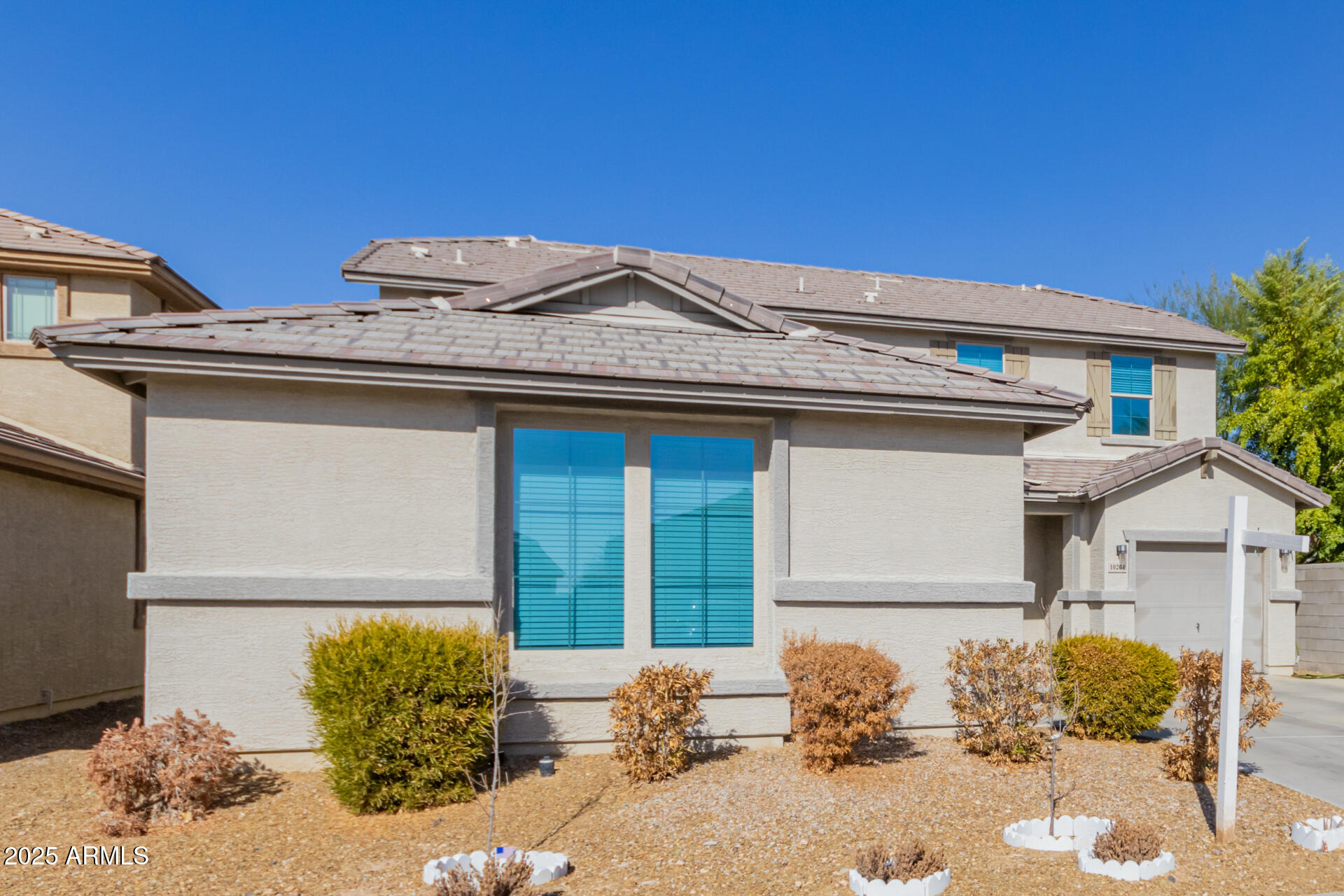 10204 W LAWRENCE Lane