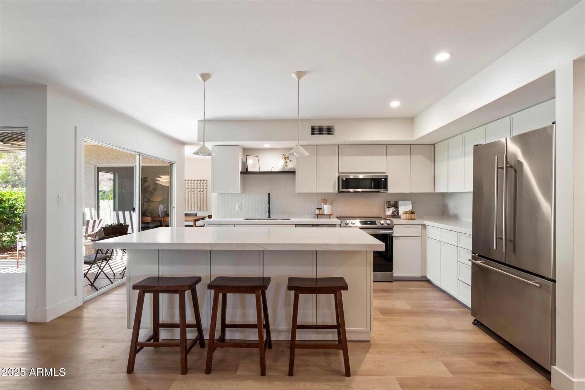 6055 E VERNON Avenue