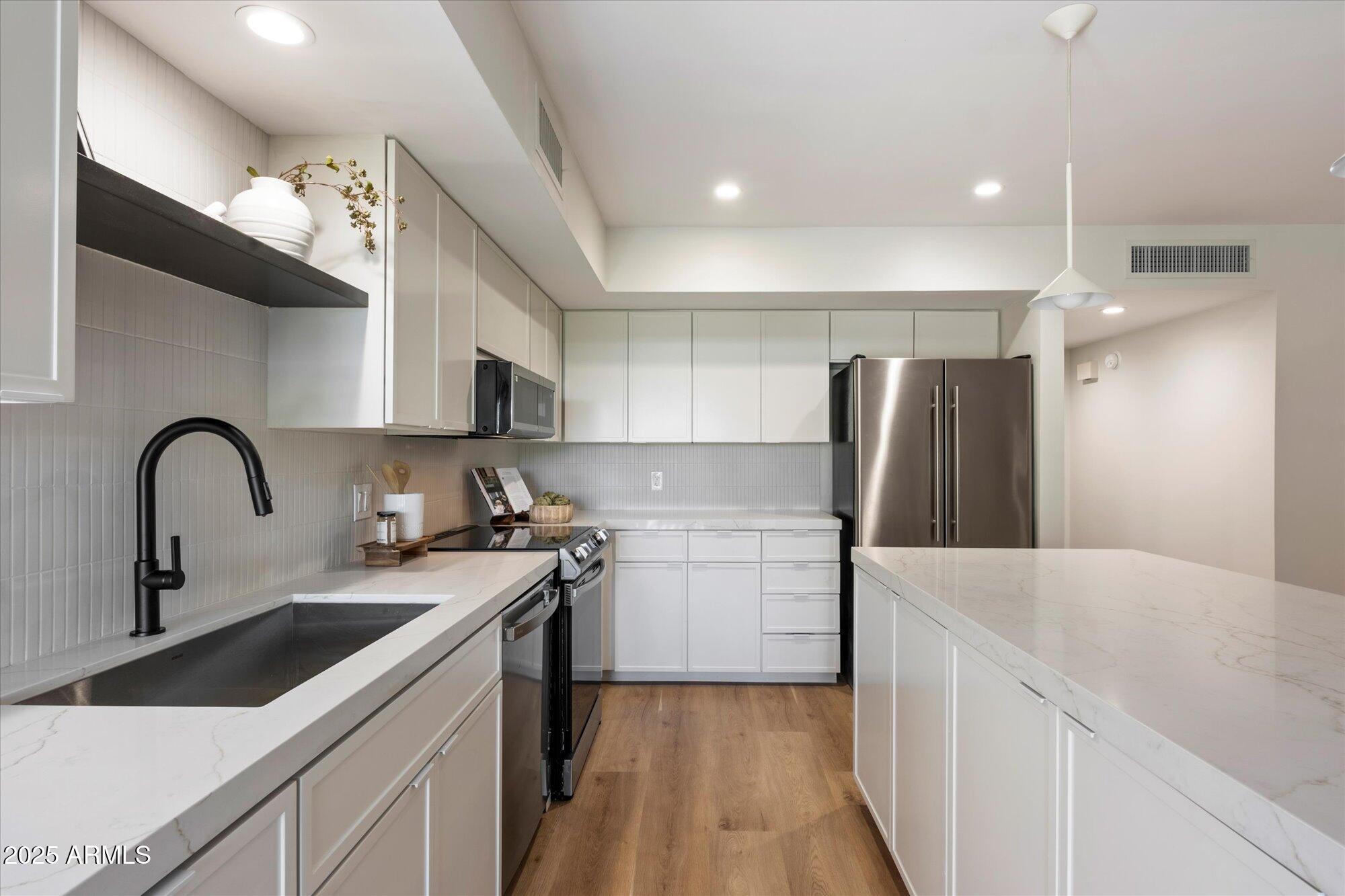 6055 E VERNON Avenue