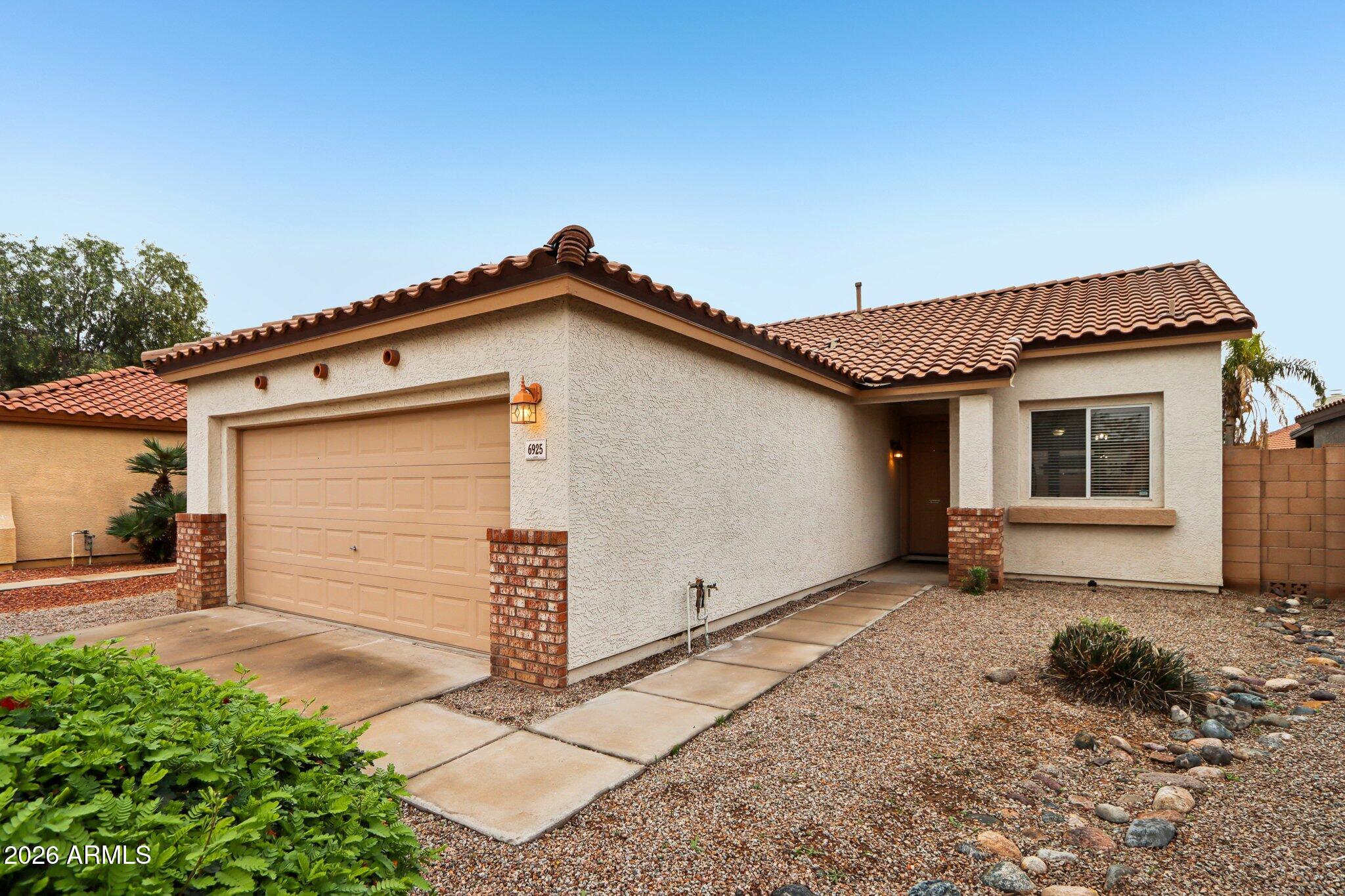 6925 W HARRISON Street