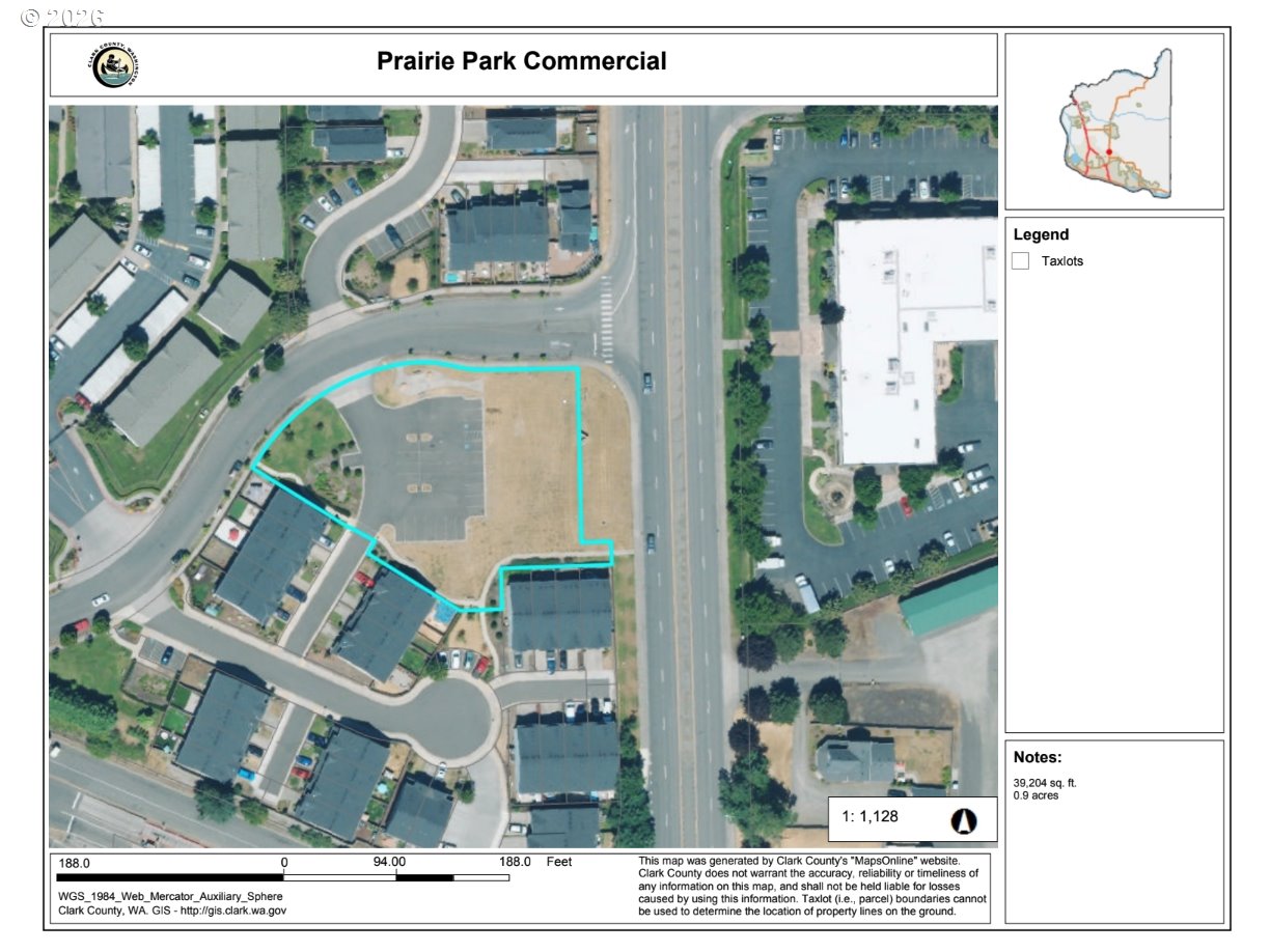 Aerial parcel map outlining a commercial lot in cyan, labeled 39,204 square feet and 0.9 acres.