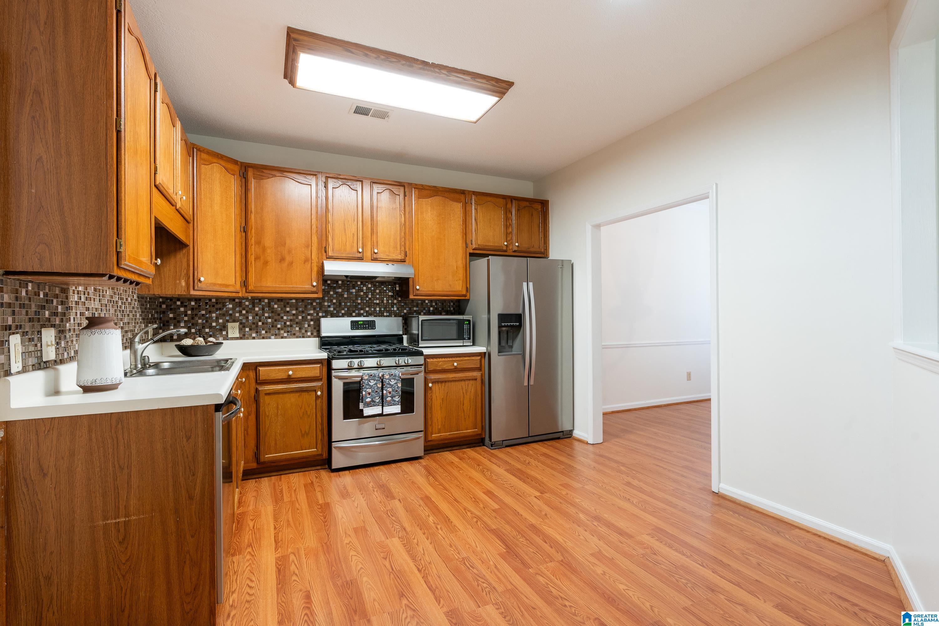 5512 WHISPERWOOD LANE