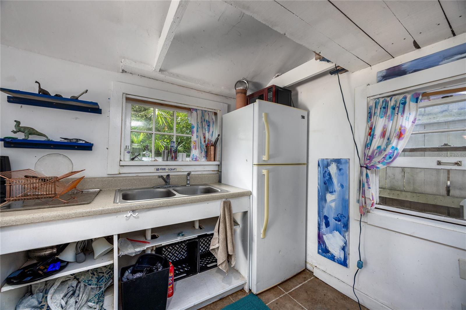 611 NE 10TH PL