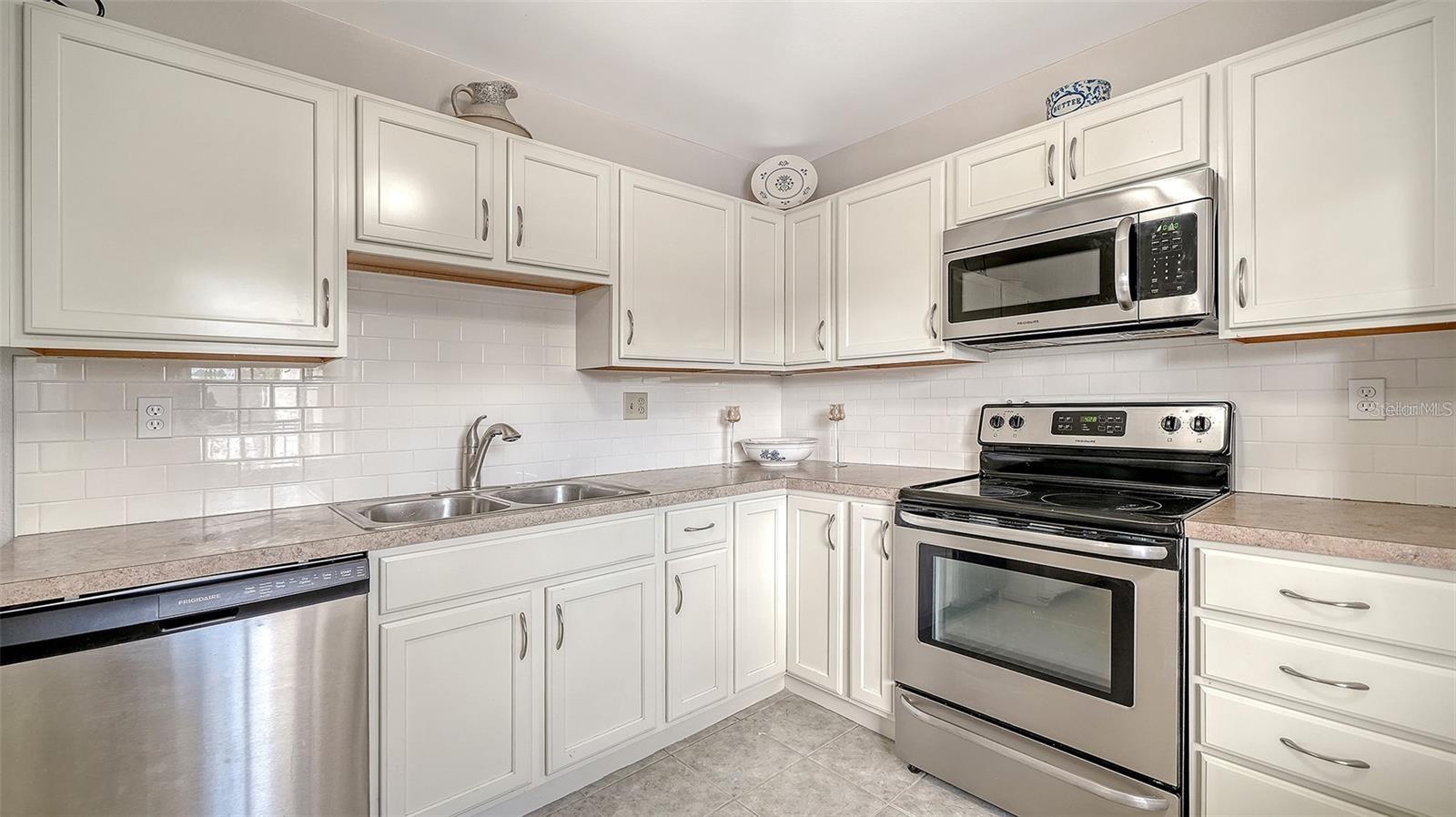 7880 PALM AIRE LN #203