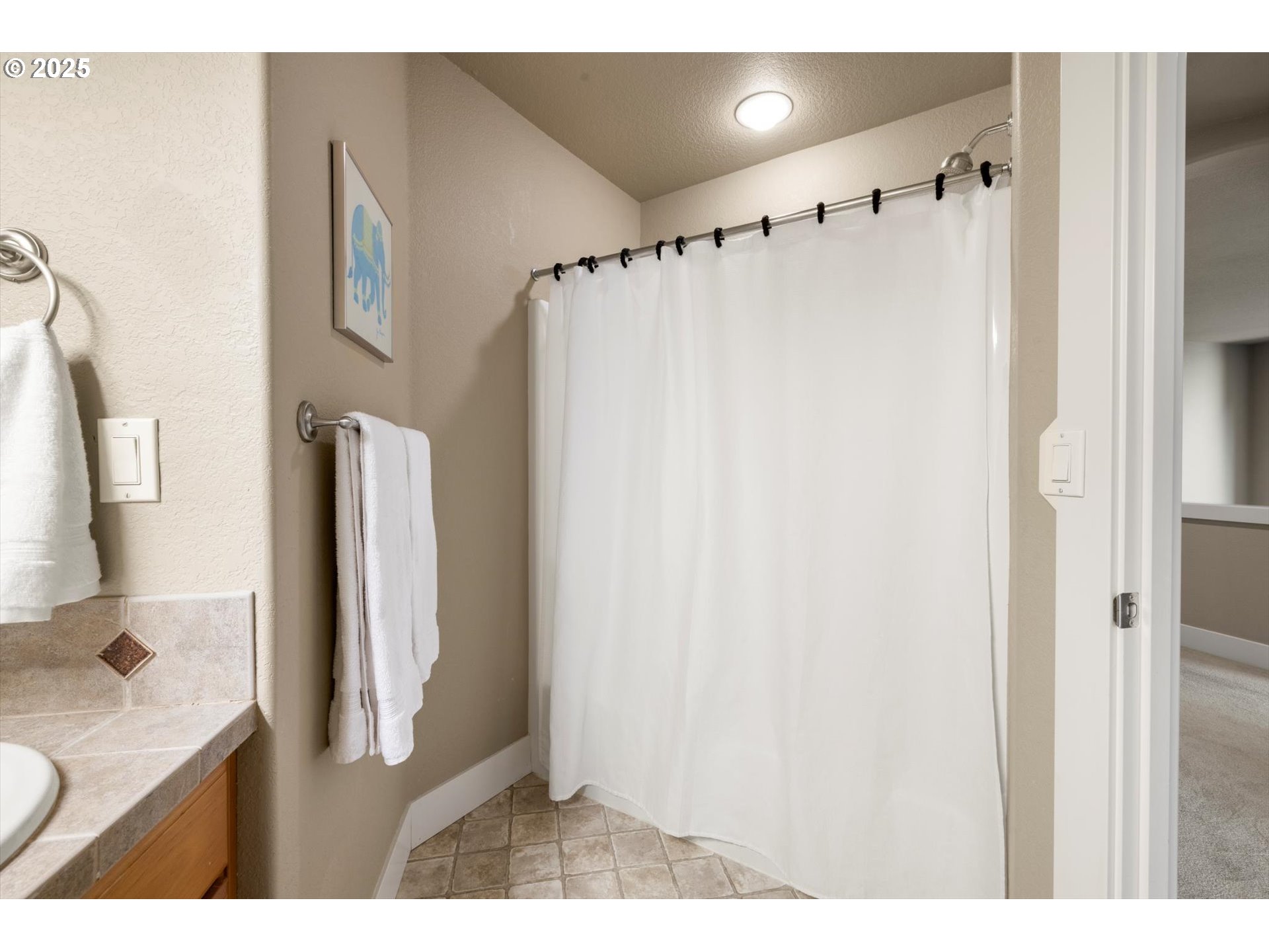 11102 NW CRYSTAL CREEK LN