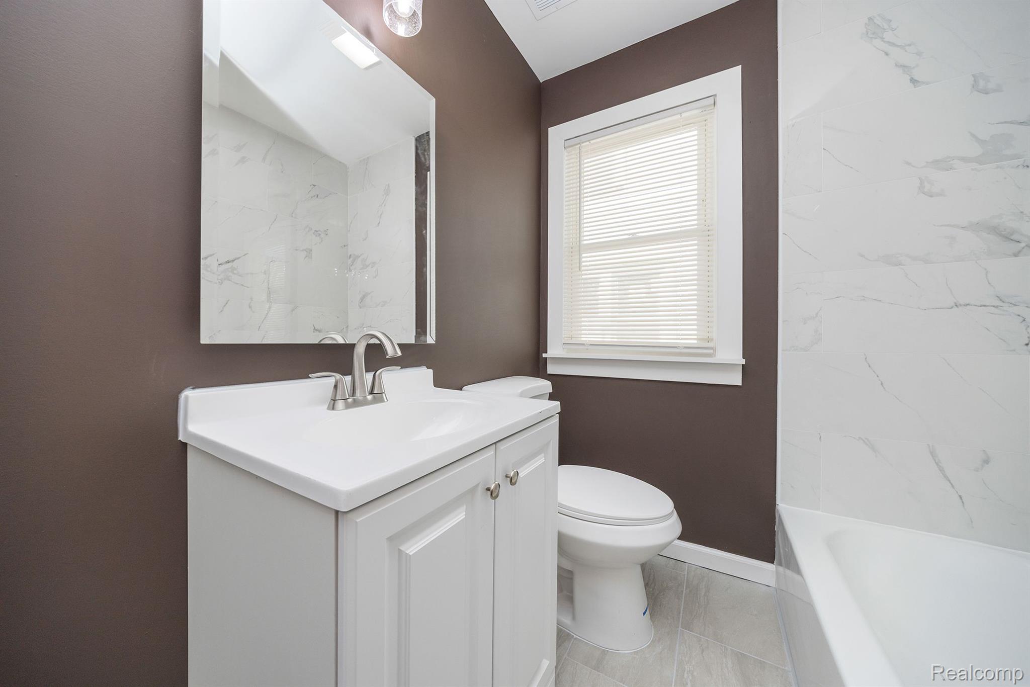 15900 WOODINGHAM Drive