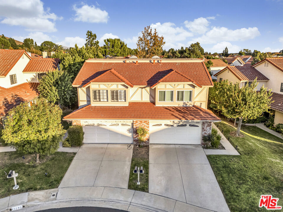 12246 Shady Hollow Lane