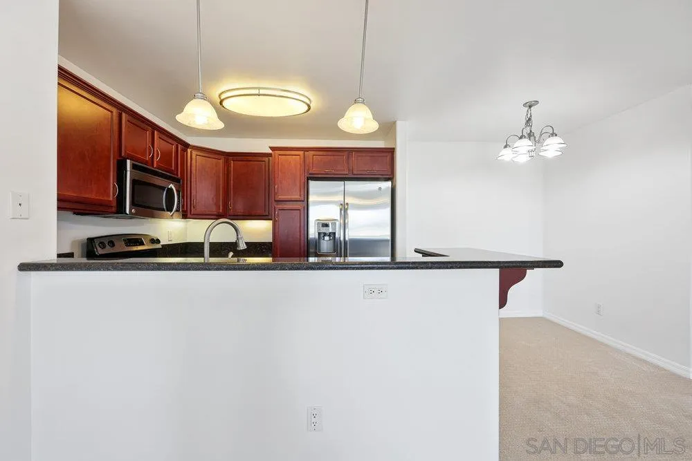 5252 Balboa Arms Dr. # 220