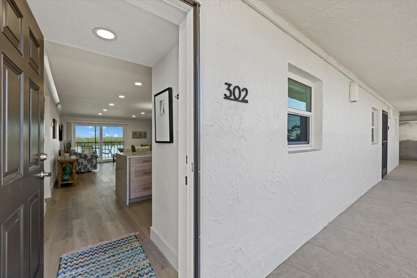 9393 MIDNIGHT PASS RD #302