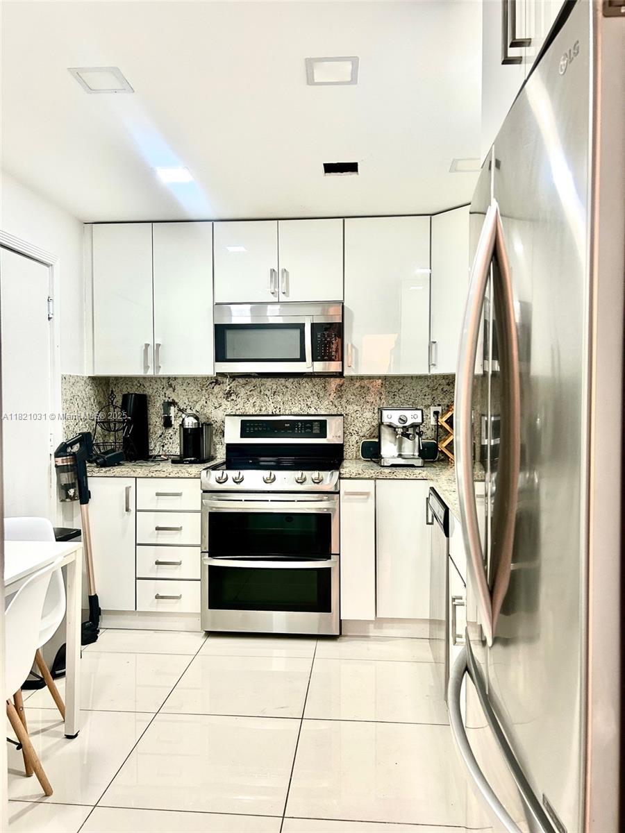 9500 W Bay Harbor Dr # 2G