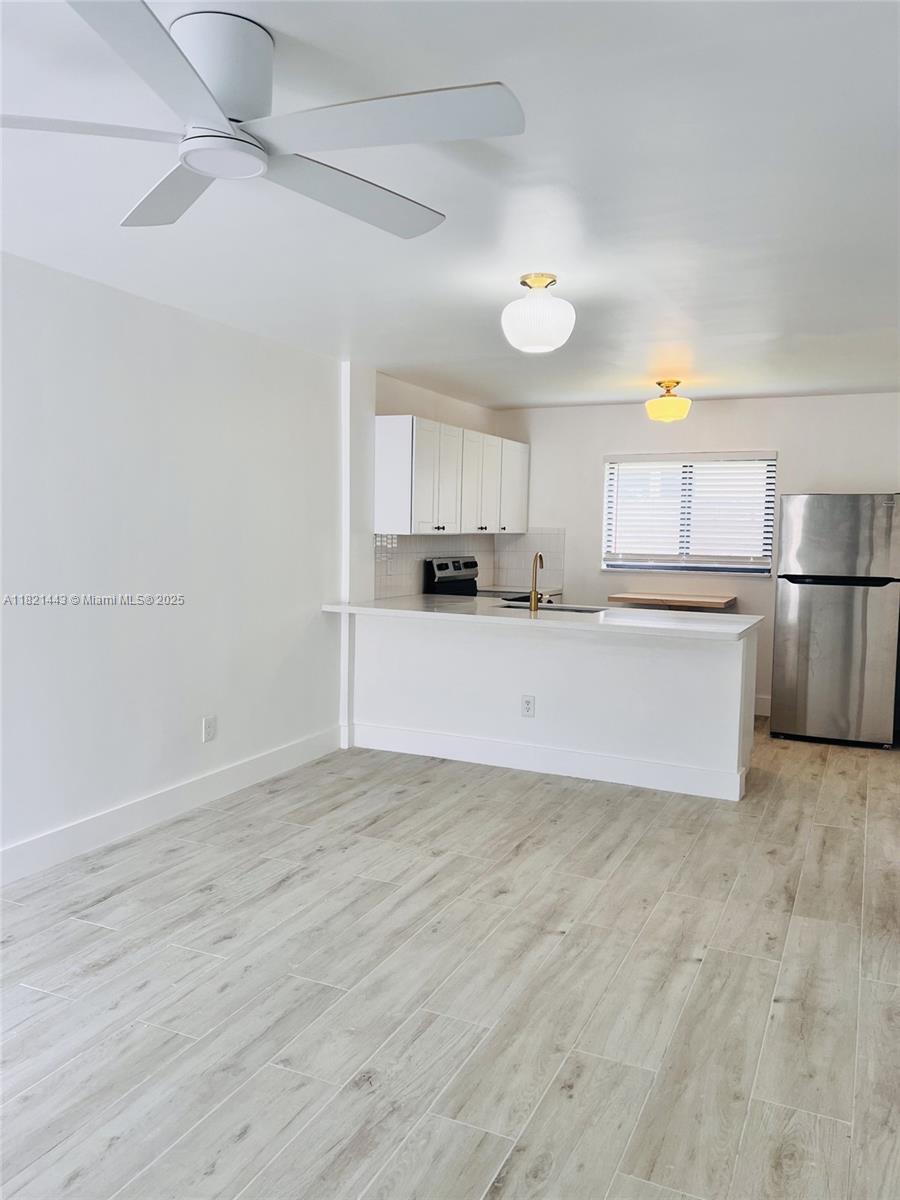 910 SW 4th Ave # 1