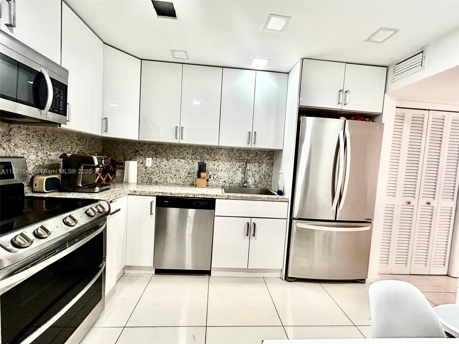 9500 W Bay Harbor Dr # 2G