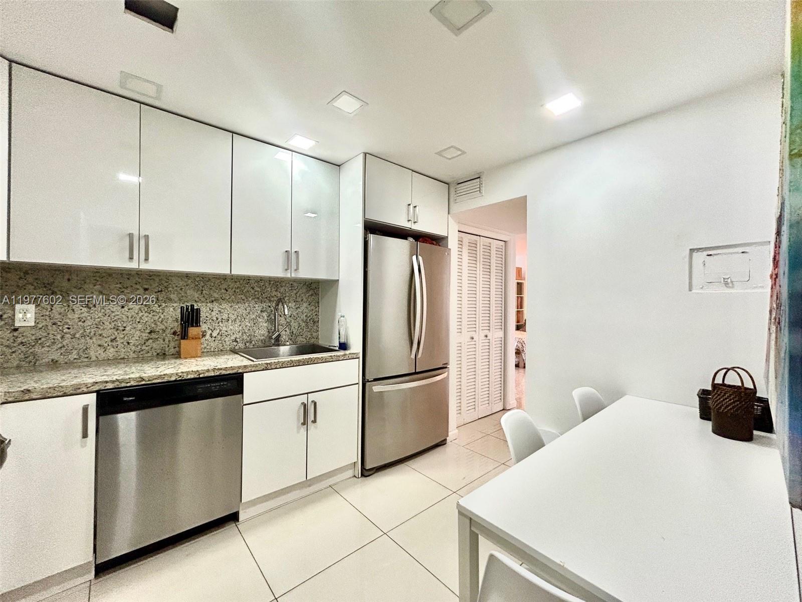 9500 W Bay Harbor Dr # 2G