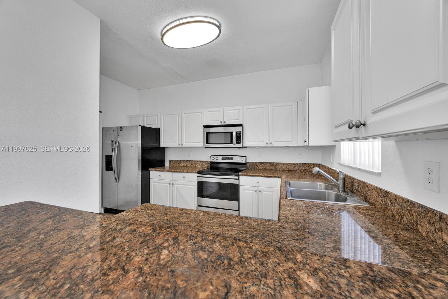 12864 SW 133rd Ter Unit: -