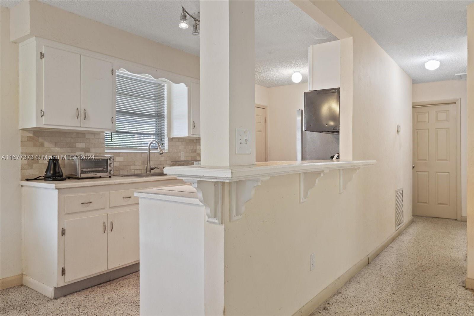 6121 Tamiami Canal Rd