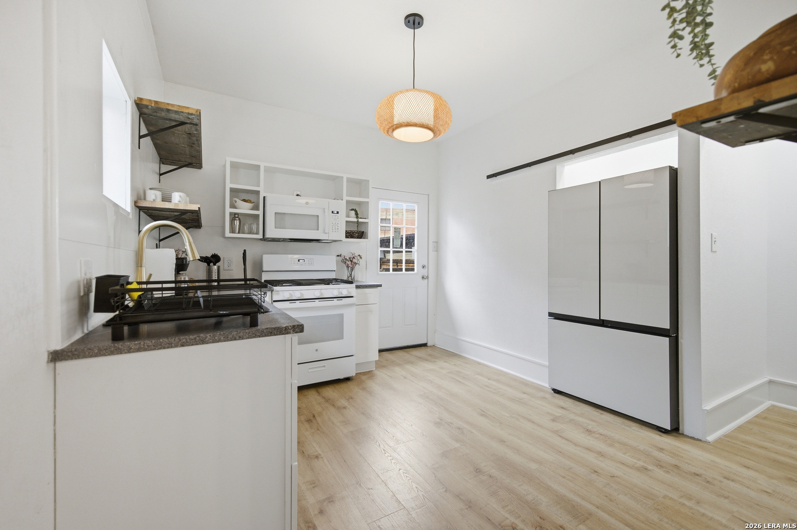 115 W HIGHLAND BLVD