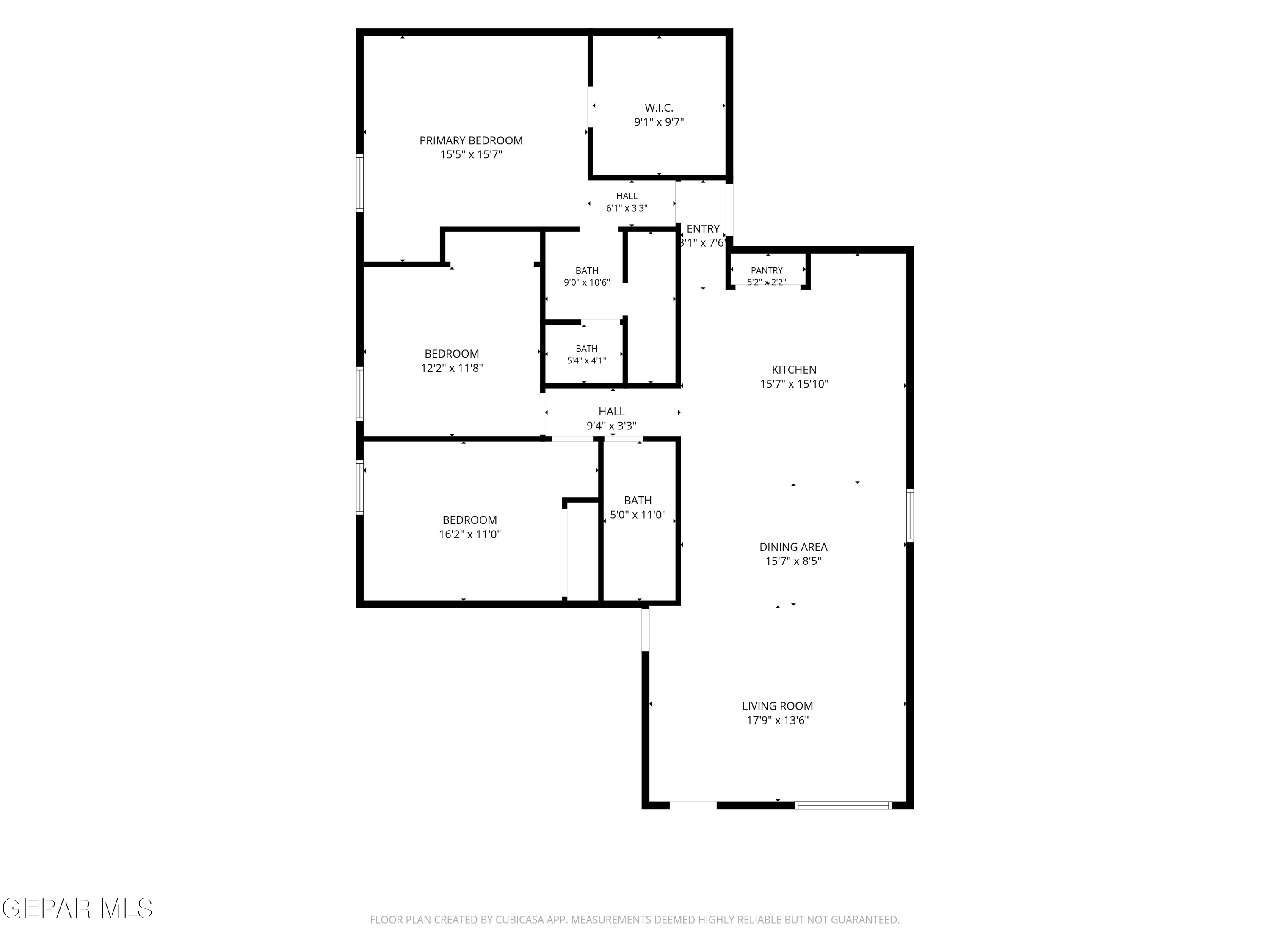 Floor plan showing three bedrooms, three bathrooms, and an open kitchen, dining area, and living room.