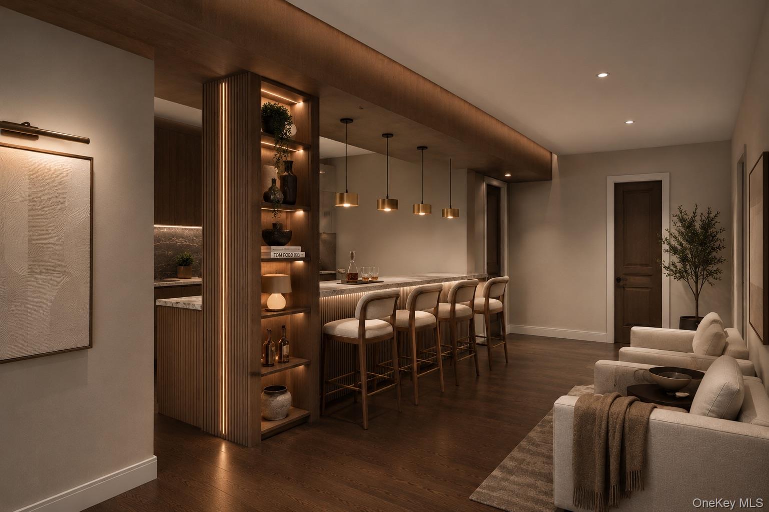 Open-plan kitchen and living area with a marble-topped island, wood-slat cabinetry, and neutral seating.