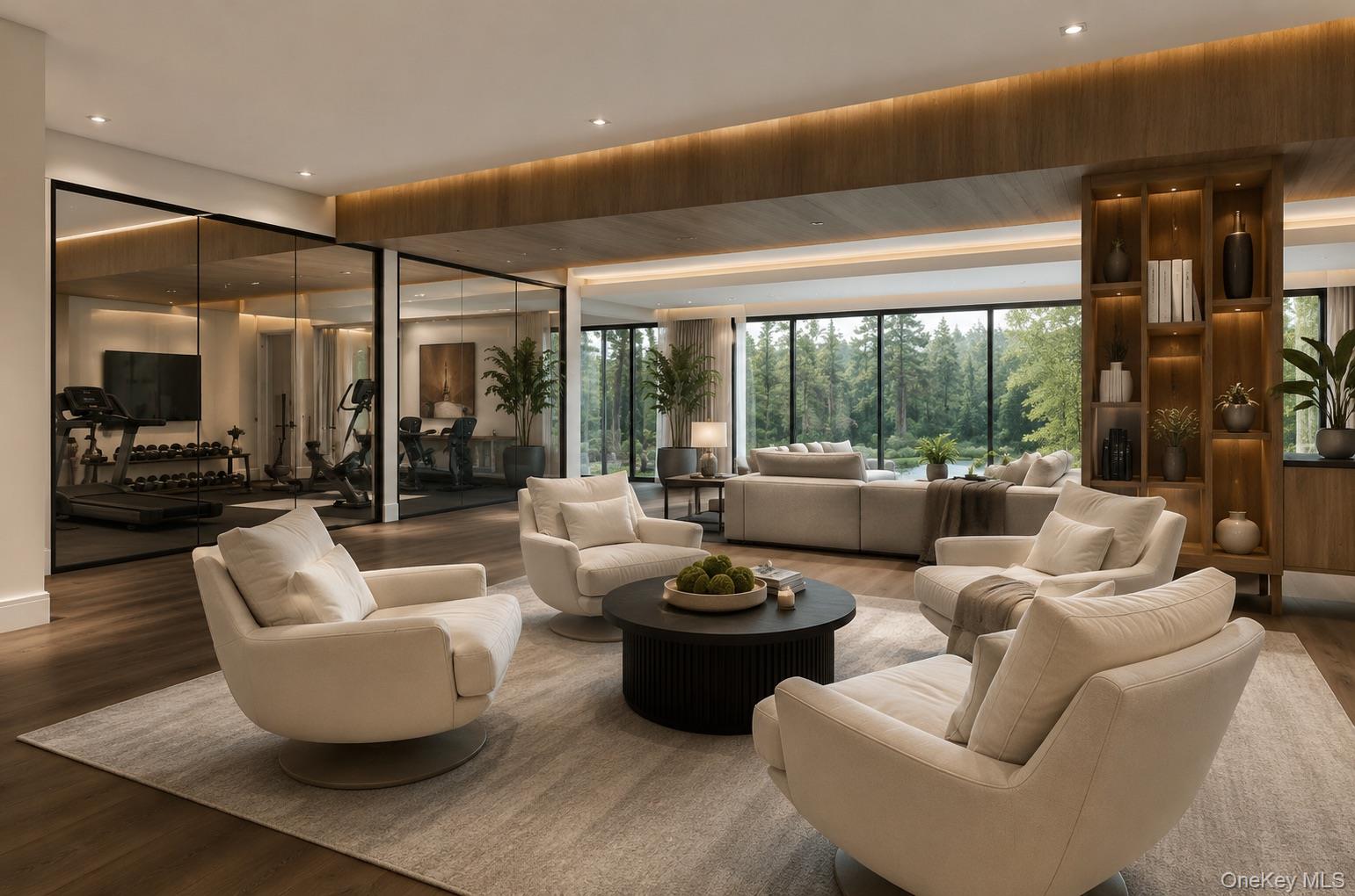 Modern living room with cream seating, floor-to-ceiling windows overlooking trees, and a glass-walled fitness room.