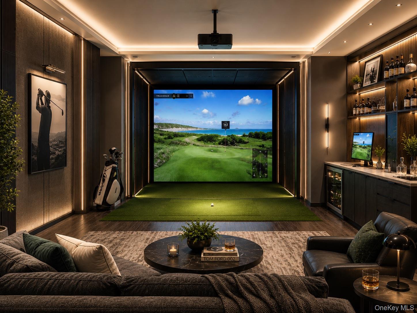 Furnished golf simulator room with putting turf, a large screen, golf bags, and a built-in bar.