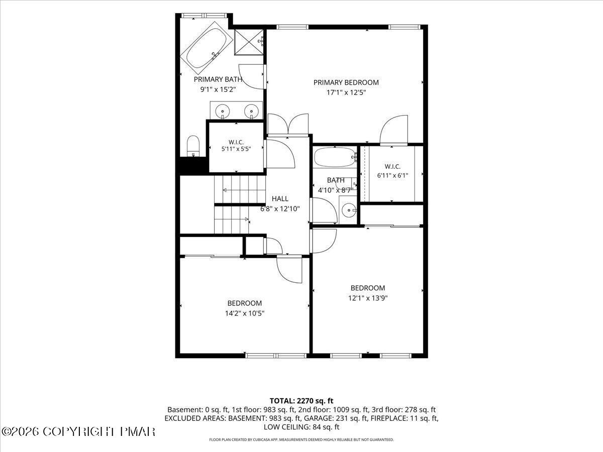 Second-floor plan showing a primary bedroom, two bedrooms, bathrooms, closets, and hall.