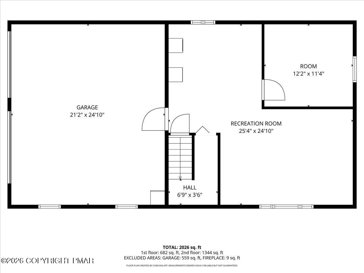 Floor plan with garage, recreation room, room, hall, and staircase.