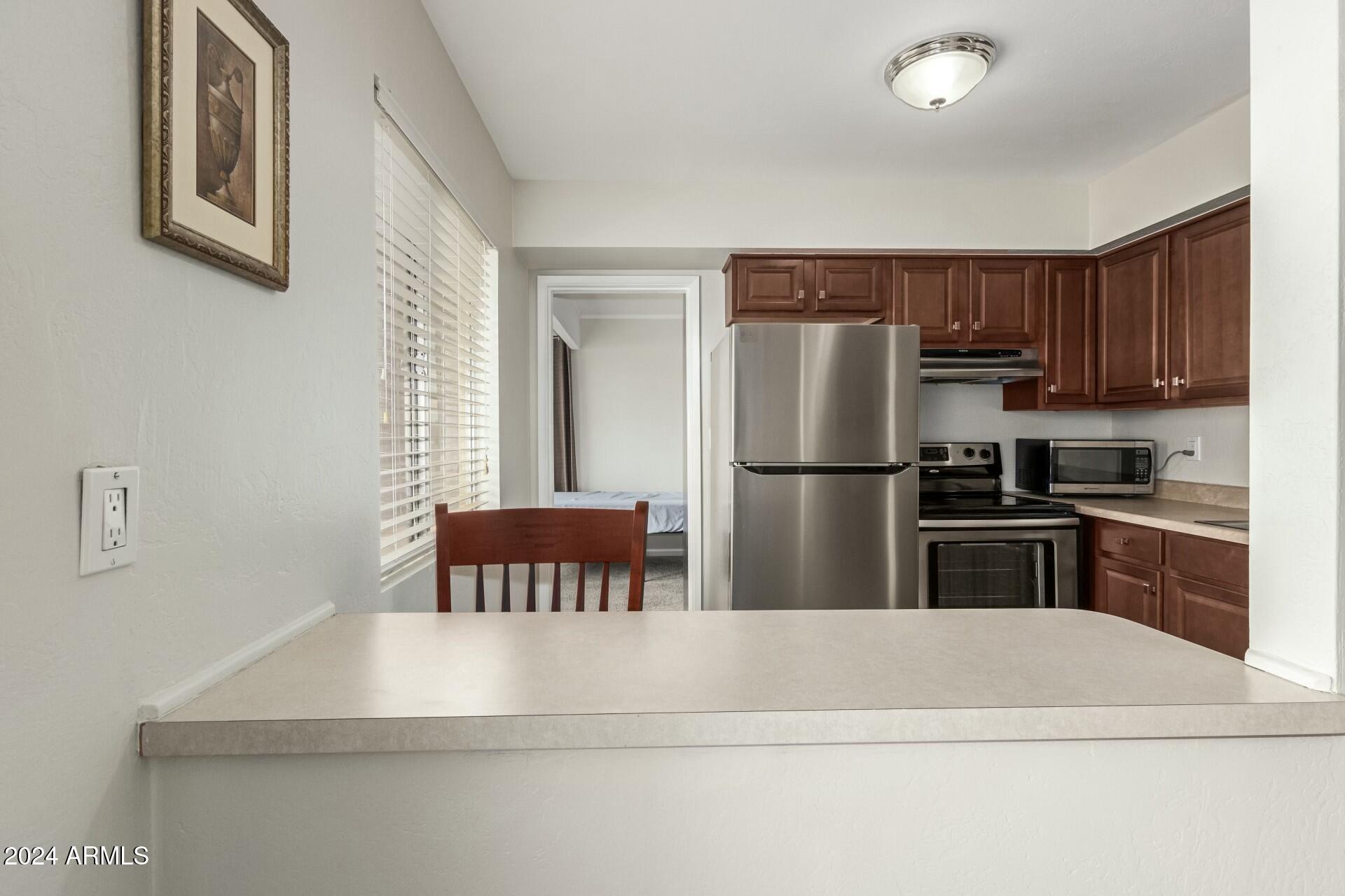 8211 E GARFIELD Street, J217