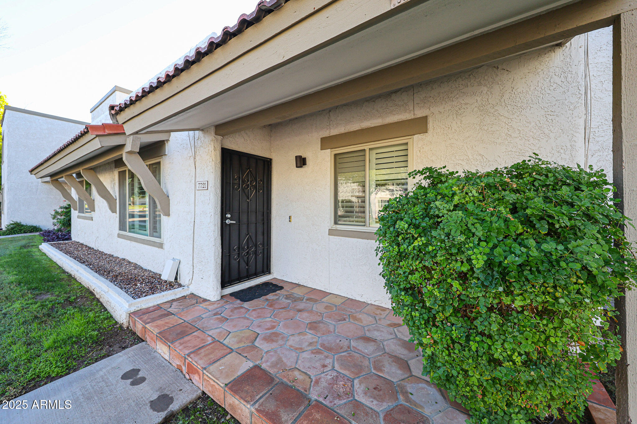 7721 E HARVARD Street