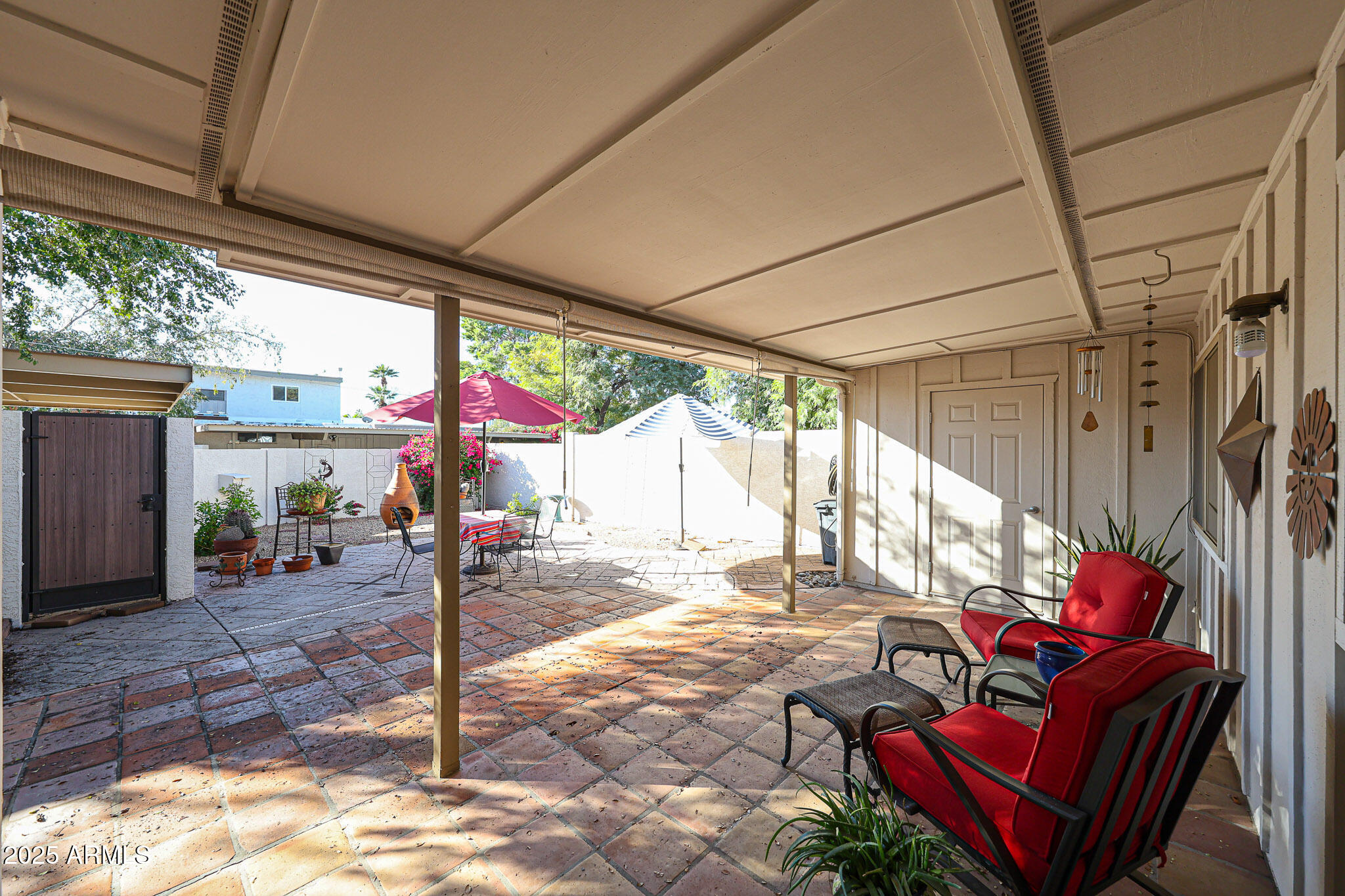 7721 E HARVARD Street