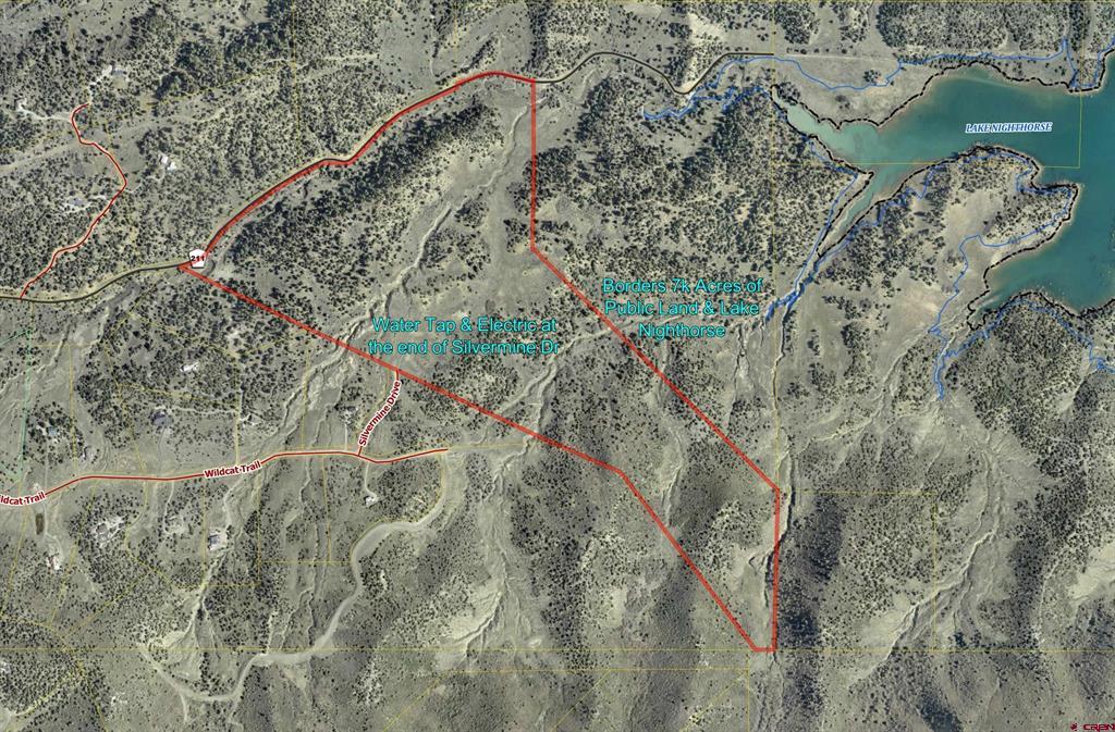 Aerial map showing the Silvermine Drive parcel outlined in red beside Lake Nighthorse.